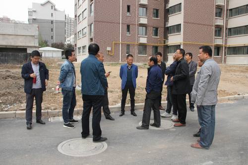 銅煤公司承建的銅煤2#小區(qū)水仙居5、6、7、8#樓順利通過竣工驗收